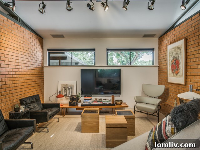 Modern kitchen with European-style cabinetry and exposed brick