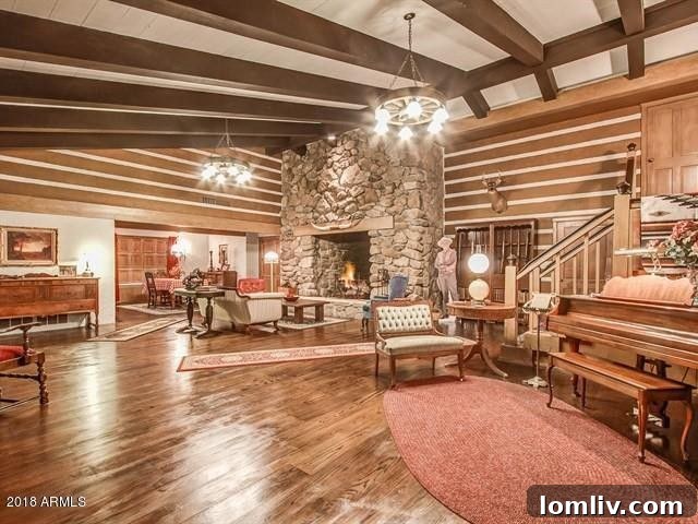 Exterior view of Lorne Greene's Ponderosa II replica home in Mesa, Arizona, featuring classic ranch architecture.