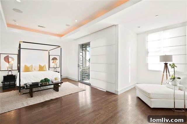 Luxury Modern Townhome Dallas - Master Bedroom with Seating Area and Rooftop Access