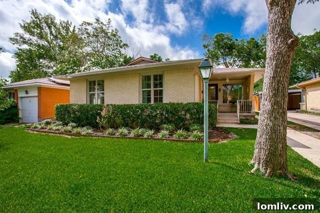 Bright and spacious living room with original hardwoods at 1918 Newport Ave
