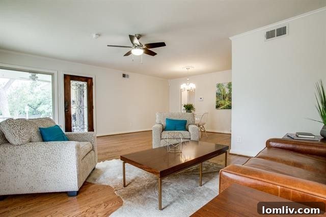 Gas cooktop and range hood in the gourmet kitchen at 1918 Newport Ave
