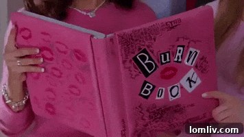 Pink carpet and decorated fireplace in a room of the house, showcasing maximalist decor