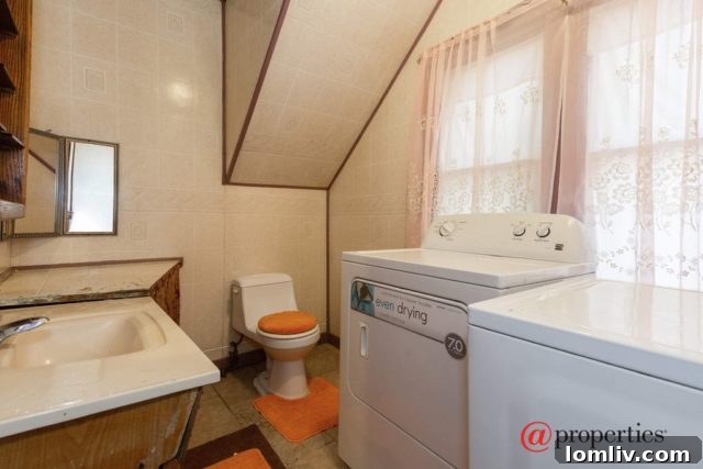 A unique door, also in a striking pink hue, contributing to the home's cohesive theme