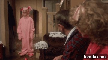 Architectural details of the pink Chicago home's exterior, including decorative elements