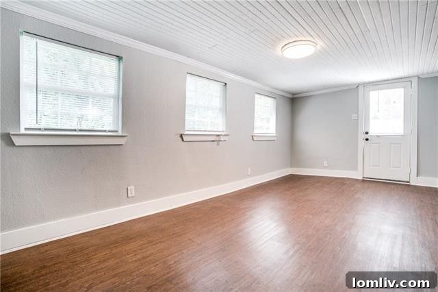 Spacious Backyard with New Privacy Fence and Green Space