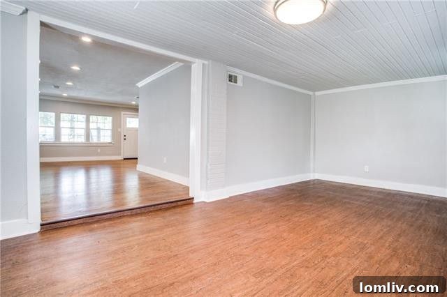 Exterior View Showing New Driveway, Walkway, and Professional Landscaping