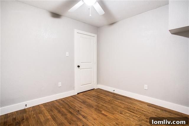 Another View of the Refinished Hardwood Floors and Open Concept