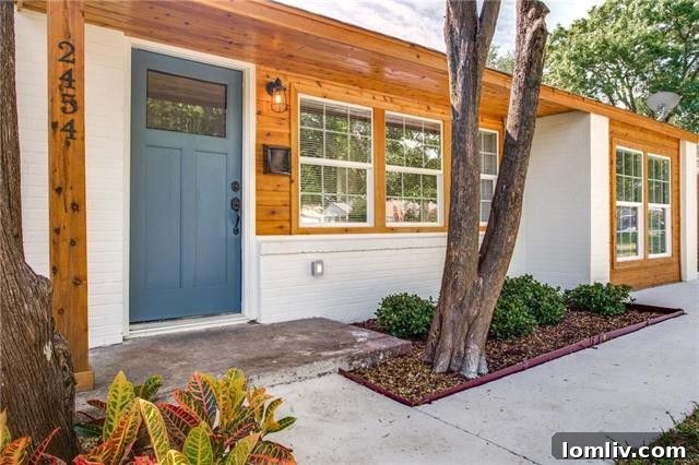 Wynnewood Ranch: Expansive Design Meets Modern Elegance 4 Spacious Open Concept Living Area with Hardwood Floors