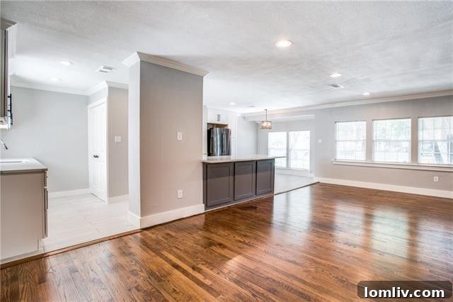 Bright and Modern Bedroom with Ample Space and Hardwood Floors