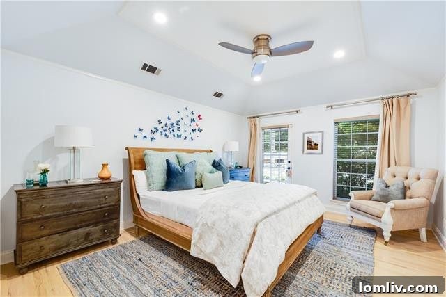 Spacious master bathroom with double vanity and elegant finishes