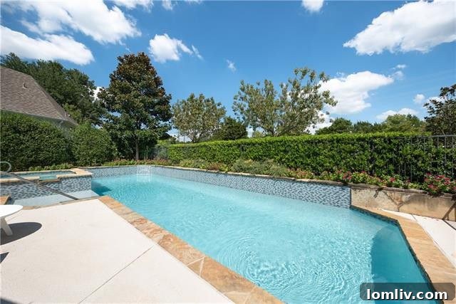 Expansive backyard of the Williamson Road property with patio space