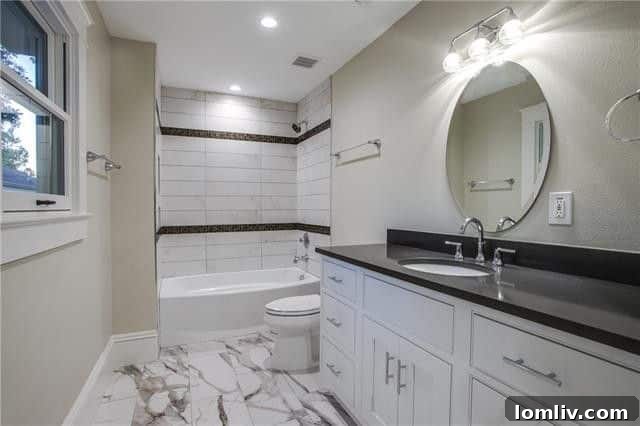 A modern, clean bathroom in the restored Victorian home