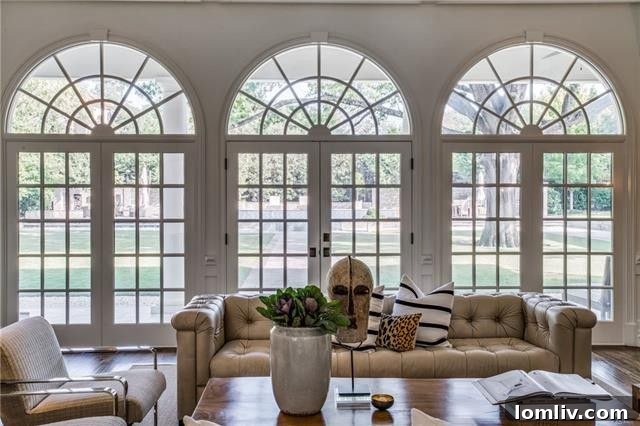View from the dining room into an adjacent formal area, highlighting open concept