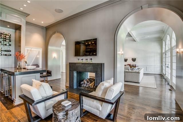 Modern gourmet kitchen featuring subway tile walls and high-end appliances