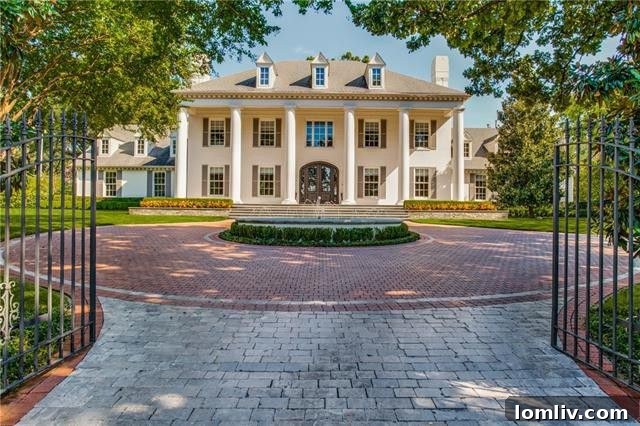 Front facade of the updated Southern Colonial home on Sunnybrook Lane, Dallas