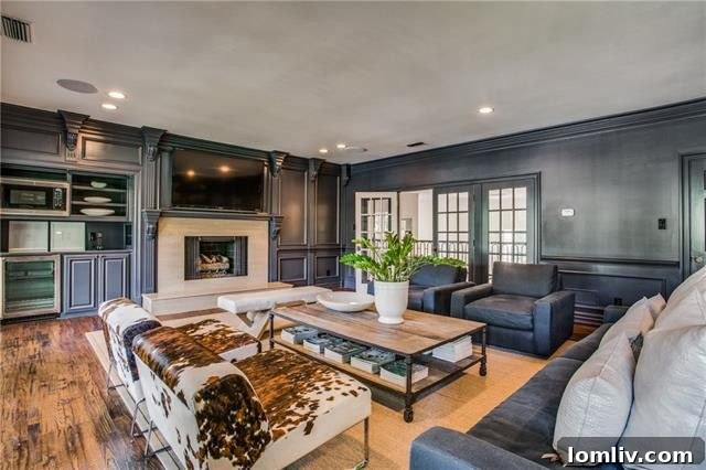 Dedicated home office or study with classic wooden desk and ample lighting