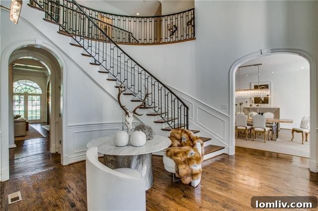 Formal living room with newly installed hardwood floors and abundant natural light