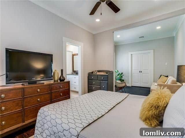 Elegant design and ample space define the master suite, offering a private haven.