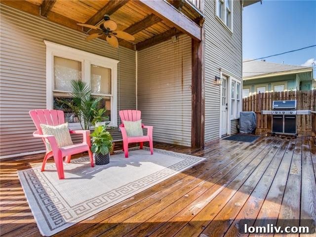 Expansive backyard of 222 N. Edgefield Ave., featuring a large deck for outdoor entertaining.