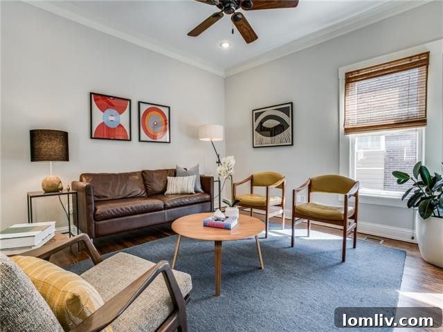 Architectural details and expansive porch of the historic Prairie-Style home in Dallas's Winnetka Heights.