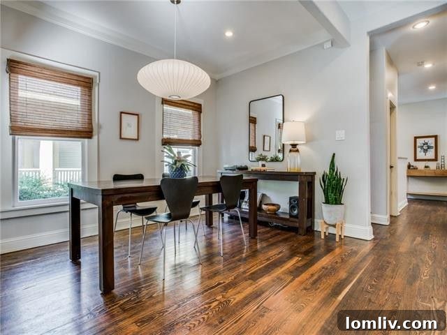Detailed view of the front facade and mature landscaping at 222 N. Edgefield Ave.