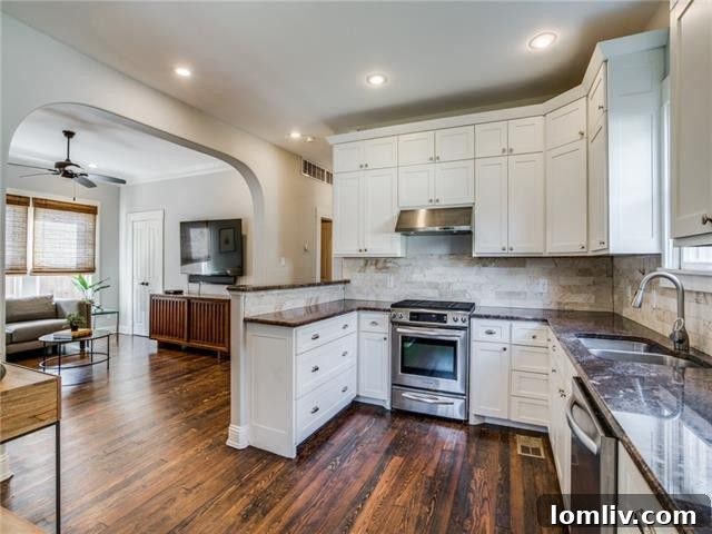 Spacious and inviting living area of the renovated Winnetka Heights home, blending historic charm with modern updates.