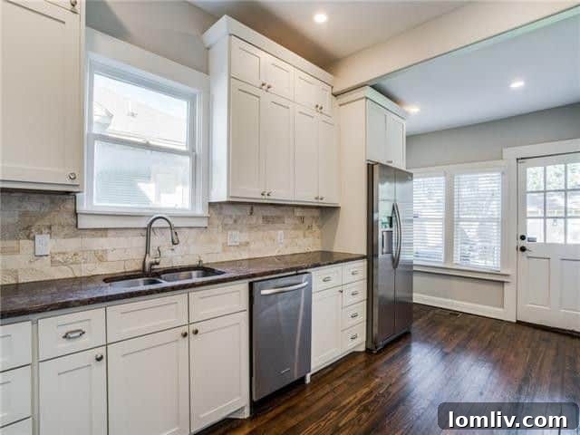 Bright and airy interior showcasing the seamless flow between living spaces at 222 N. Edgefield Ave.