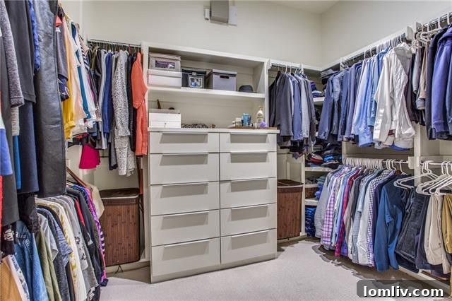 A modern shower enclosure within the spacious master bathroom.