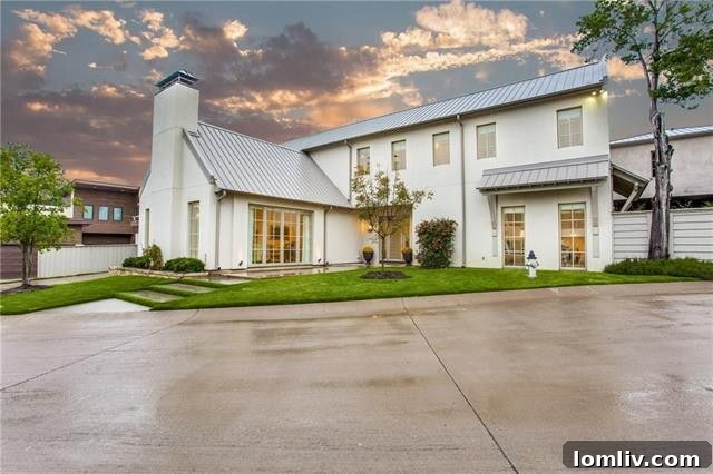 Front exterior of the modern transitional home at 605 Kessler Reserve Court, Dallas, Texas, nestled in a gated community.