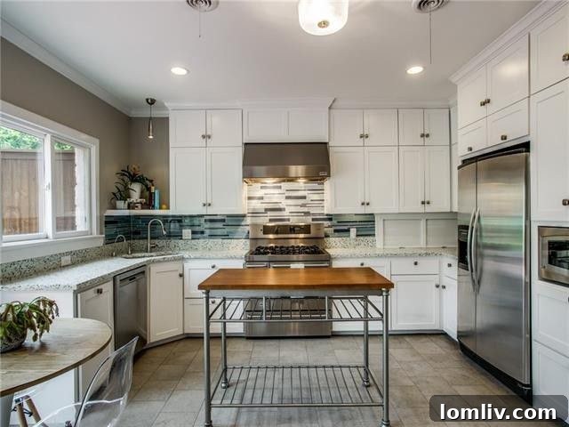 Expansive fenced backyard resembling an English garden, with potential for a pool.