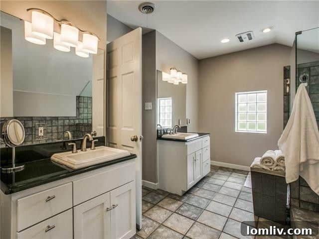 Another beautifully appointed bedroom, offering comfort and privacy.