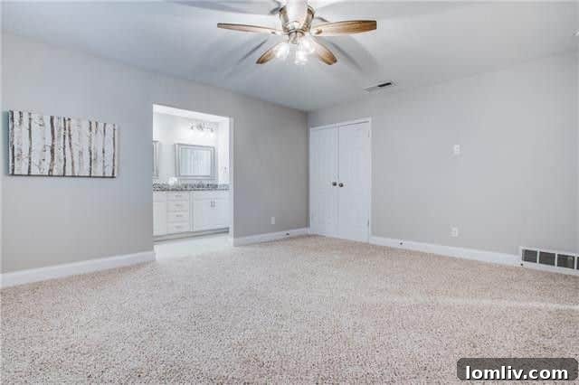 Spacious Master Bathroom with Double Sinks and Granite