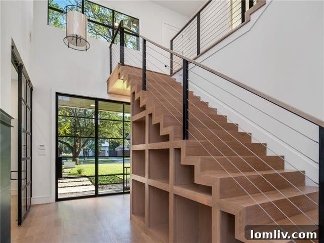 Elegant custom steel pivotal front entry door with adjoining windows