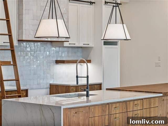 Gourmet kitchen featuring walnut cabinets and Moroccan Zelige tile backsplash