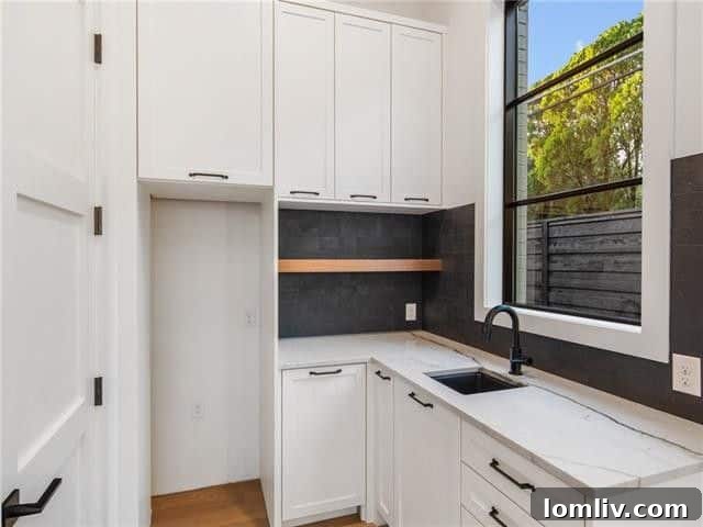 Stylish downstairs bar area with black wood grain tile backsplash and floating walnut shelf