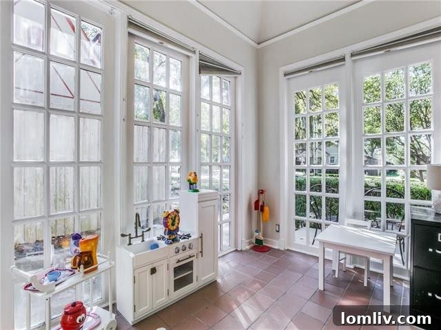 Sunroom with large picture windows and abundant light