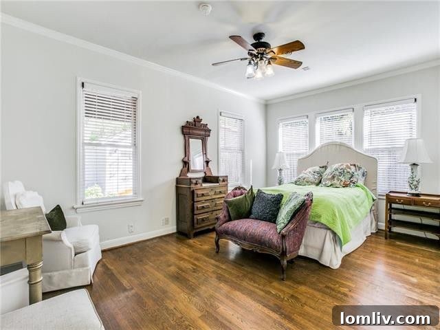 Spacious master bedroom with hardwood floors