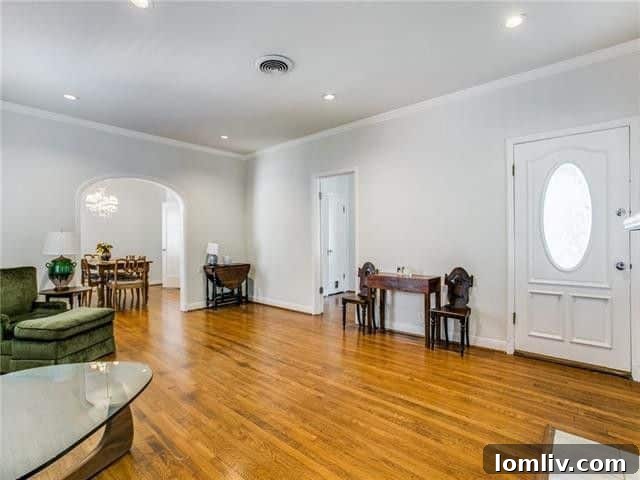 Bright and spacious central hall interior of a Tudor home