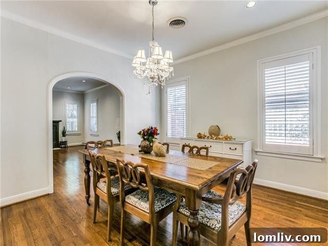 Elegant dining room with arched entryway and natural light