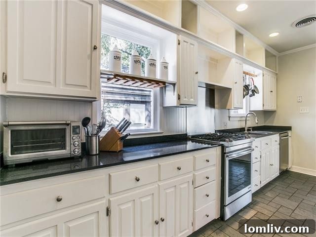 Bright and modern kitchen with white cabinets and stone counters