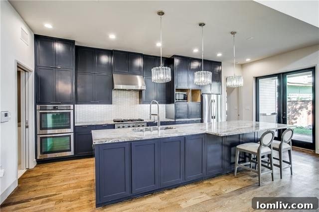 Modern gourmet kitchen with a 14-foot island, state-of-the-art appliances, and an appliance garage for seamless organization.