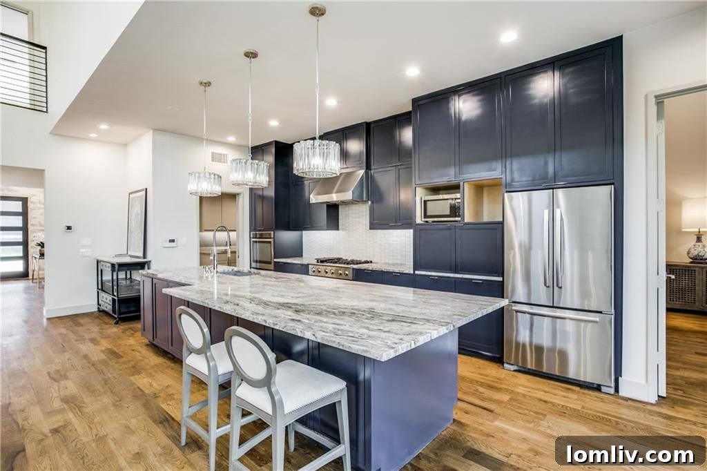 Detail view of the spacious kitchen island with premium finishes, ideal for entertaining and family gatherings.