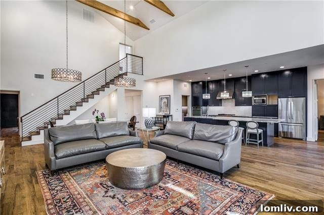 Architectural detail of the grand living room, emphasizing the fireplace and floor-to-ceiling windows for a bright, open feel.