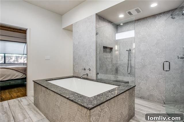 Elegant master bedroom showcasing luxurious design and a serene atmosphere, part of Stephan Sardone's custom home.