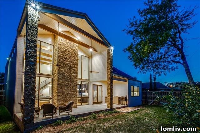 Captivating exterior shot of Stephan Sardone's custom Lake Highlands home, showcasing its unique architecture and inviting design.