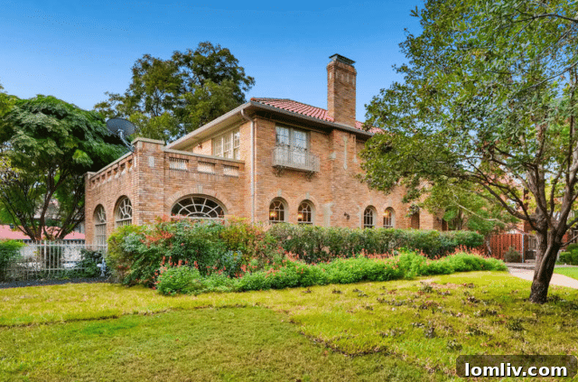 Ruth Story Wins Exclusive Windsor Place Listing 3 Detailed view of the Spanish Colonial Revival façade with arched entrance and tile roof