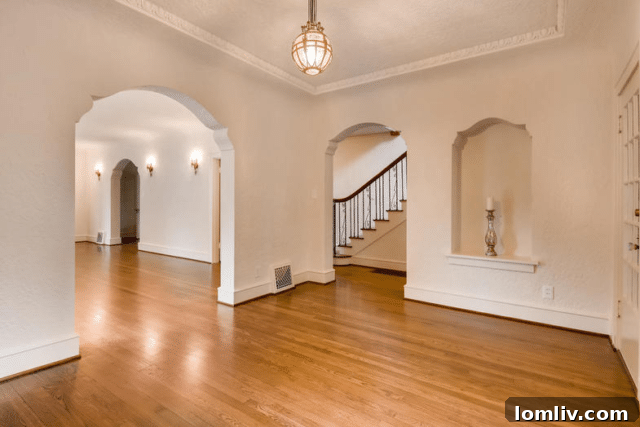 Ruth Story Wins Exclusive Windsor Place Listing 5 Spacious entrance vestibule of the historic Fort Worth home, featuring corbeled arches