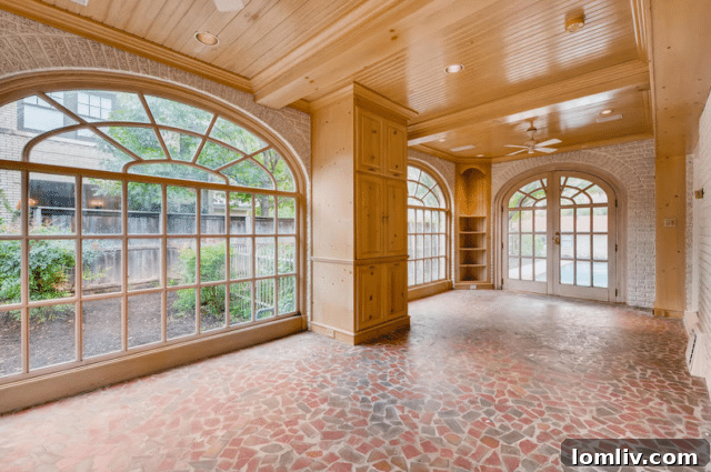 Ruth Story Wins Exclusive Windsor Place Listing 8 Charming kitchen with gas cooktop island, brass hardware, and ample storage