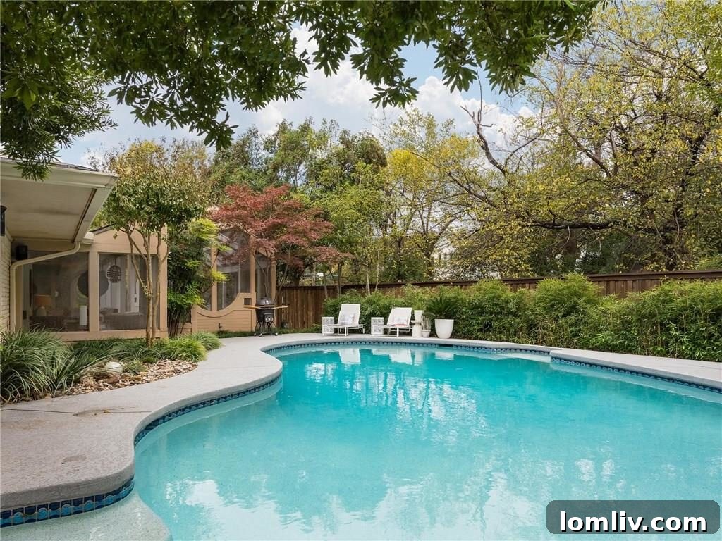 Enchanting Backyard Evening View with Pool Lighting