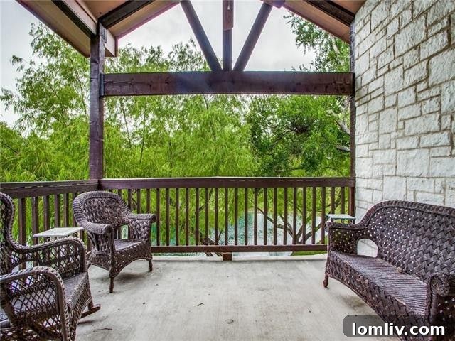 Expansive Wrap-around Porch with Serene Pond View